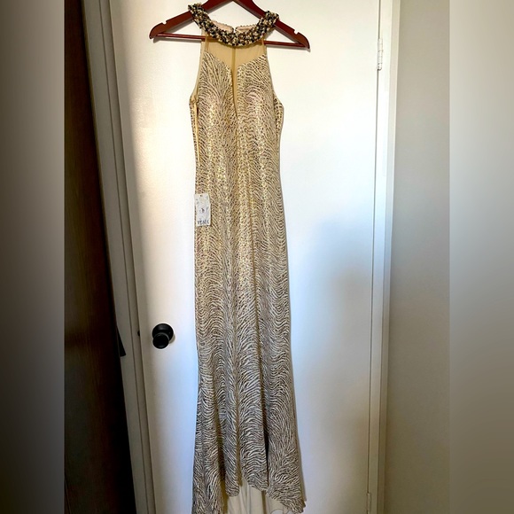 Dresses & Skirts - Gorgeous dress, S -M because of its stretchy materials.